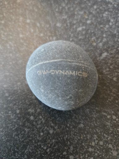 Laser etched beach pebble